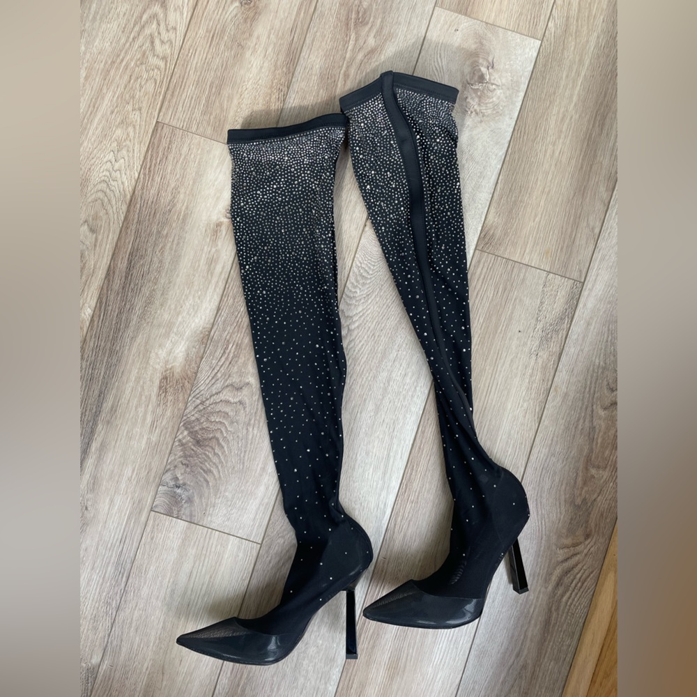 Also thing high sparkly boots